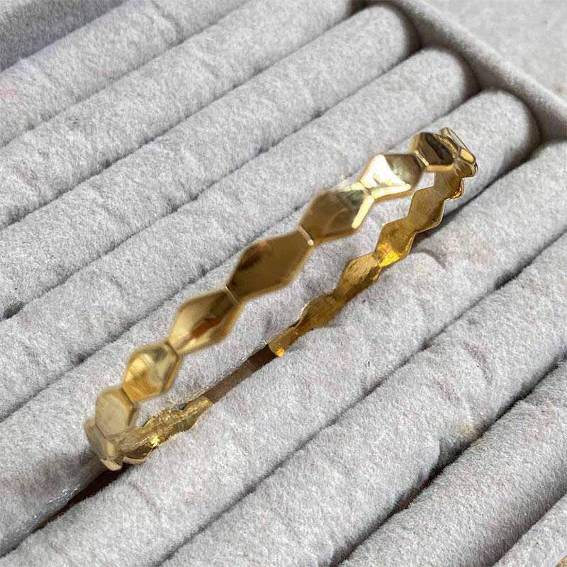 Gold-polished Beehive Bangle by Collection de Euphoria
