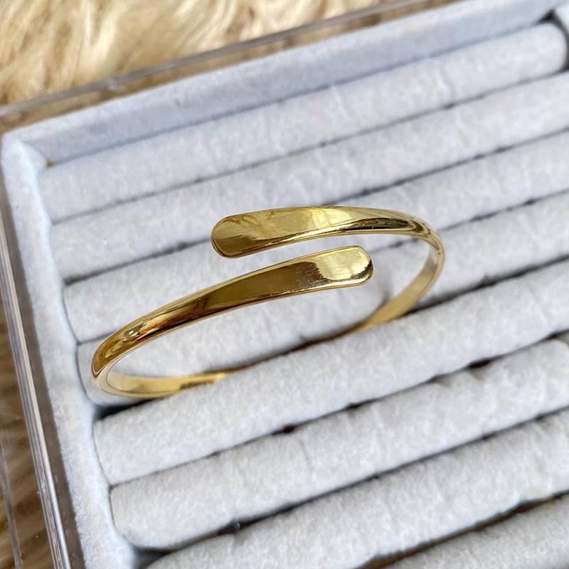 Gold-polished Eloise Bangle by Collection de Euphoria