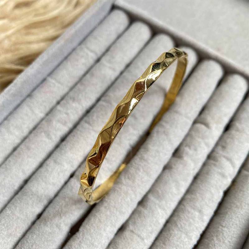 Gold-polished Dia Bangle by Collection de Euphoria