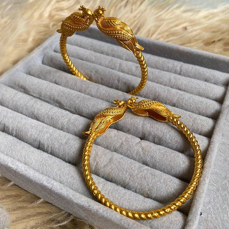 Gold-polished Peacock Bala Bracelet by Collection de Euphoria