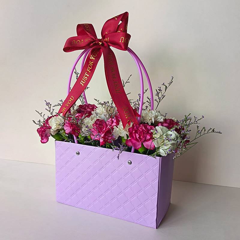 White & Fireberry Pink Carnations in Paper Tote