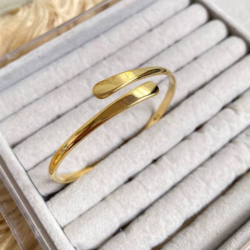 Gold-polished Eloise Bangle by Collection de Euphoria
