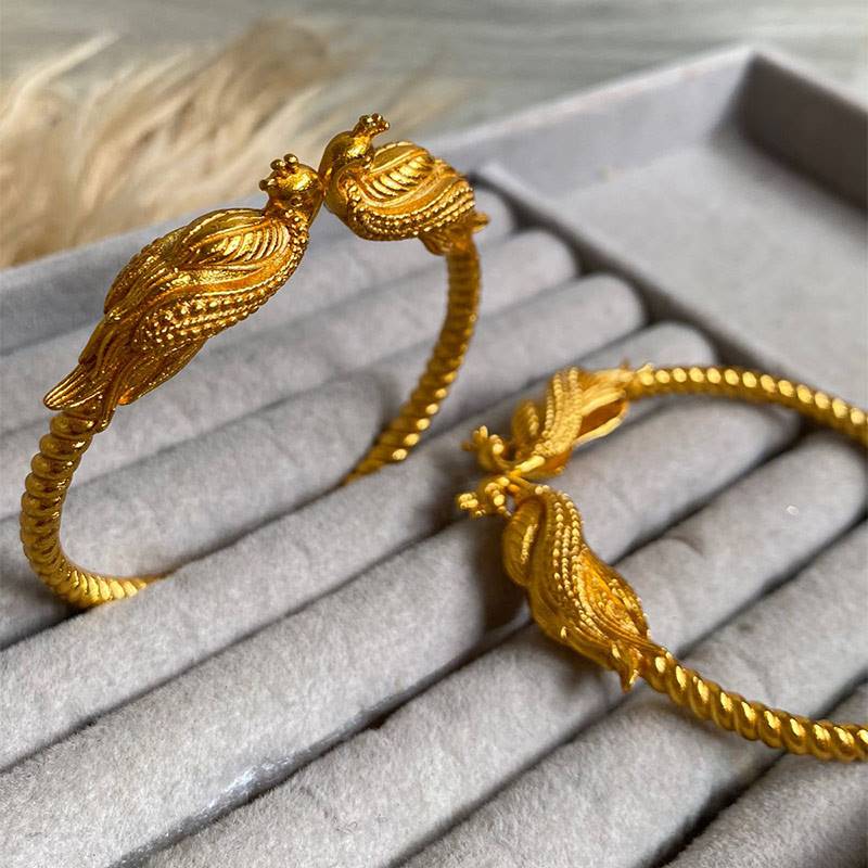Gold-polished Peacock Bala Bracelet by Collection de Euphoria