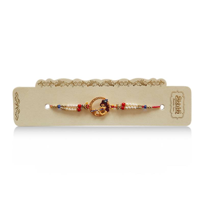 Lord Krishna Rakhi with Red and White Beads