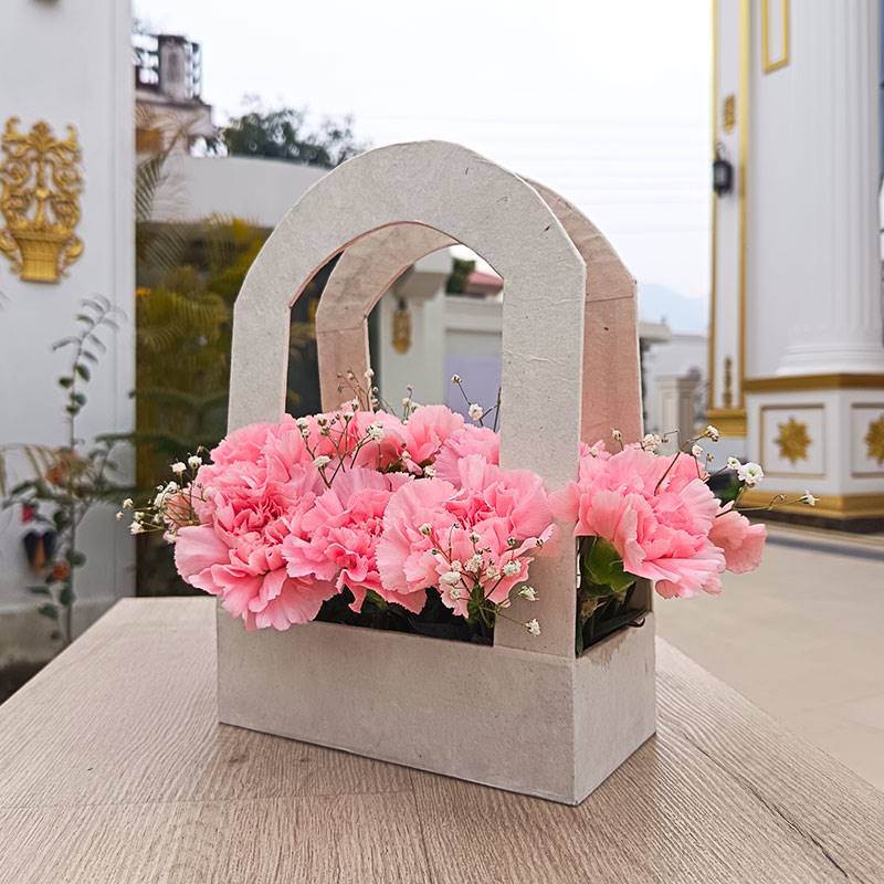 Pink Carnations in Arch Lokta Basket