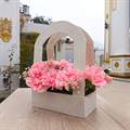 Pink Carnations in Arch Lokta Basket